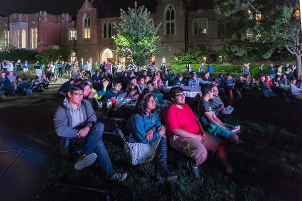 Students gather on the South Quad to watch a 2016 presidential debate.
